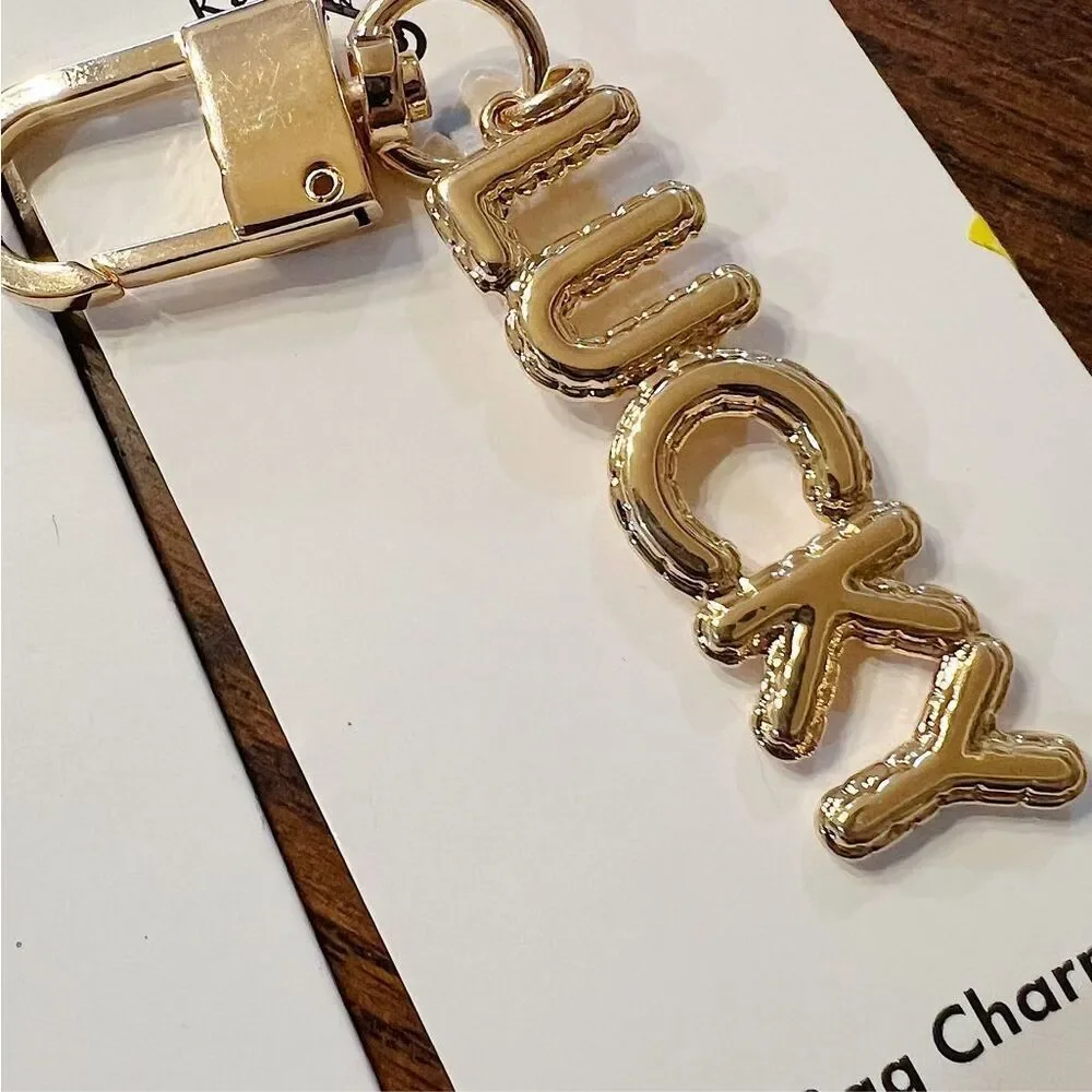 Kate Spade Lipstick Lucky Keychains Charm New 2 pieces
